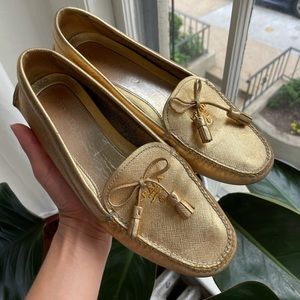 Prada gold loafers in great condition